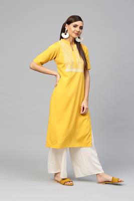 Yellow printed crepe kurtas-and-kurtis 3