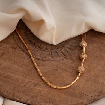 Golden mugappu necklace MEDIUM length with three white stone balls one gram gold 1