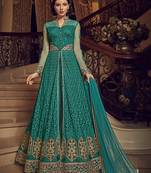 Turquoise Embroidered Net Salwar With Dupatta