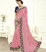 Pink embroidered georgette saree with blouse