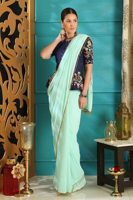 Turquoise embroidered georgette saree with blouse 3