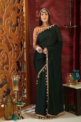 Dark green embroidered georgette saree with blouse 1