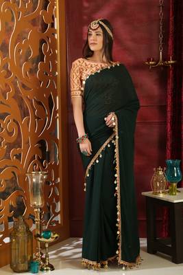 Dark green embroidered georgette saree with blouse 2