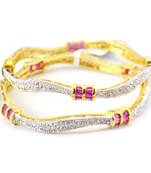 Alluring Curvy Bangles With Coloured Baguette Stones
