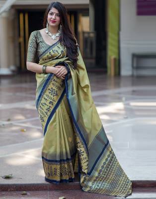 Green woven silk blend saree with blouse 1