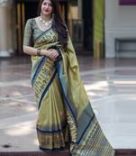 Green woven silk blend saree with blouse