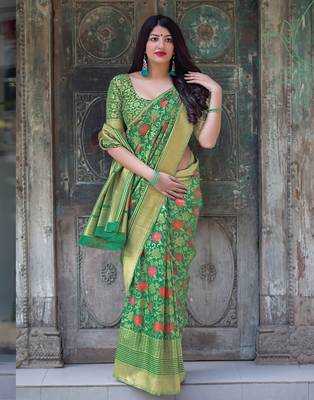 Green woven silk blend saree with blouse 1