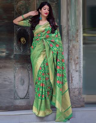 Green woven silk blend saree with blouse 2