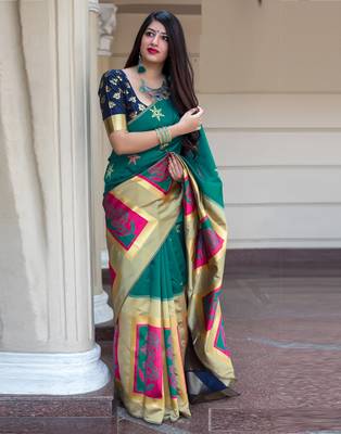 Green woven silk blend saree with blouse 1