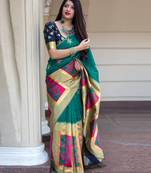 Green woven silk blend saree with blouse