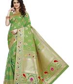Green woven banarasi saree with blouse