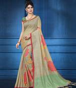 Cream woven tanjore silk saree with blouse
