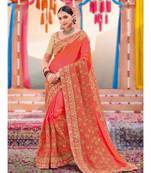 orange embroidered satin saree with blouse
