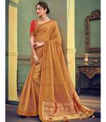 beige embroidered georgette saree with blouse