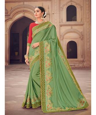 green embroidered satin saree with blouse 1