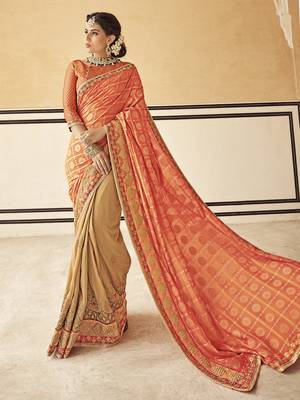 Orange woven silk blend saree with blouse 1