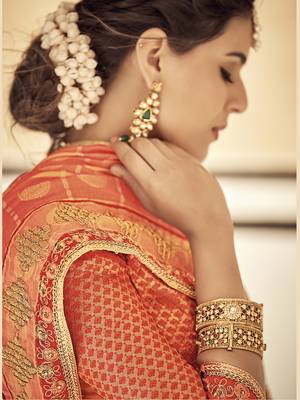 Orange woven silk blend saree with blouse 2