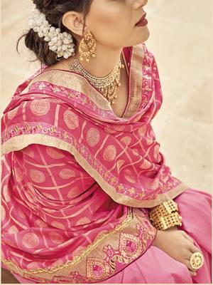 Pink woven silk blend saree with blouse 2