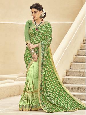 Green woven silk blend saree with blouse 1