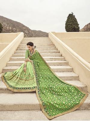 Green woven silk blend saree with blouse 2