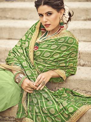 Green woven silk blend saree with blouse 3