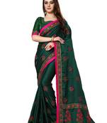 Dark green embroidered satin saree with blouse