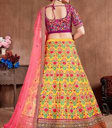 Yellow Thread, Dori, Zari, and Sequins Embroidered with stonework Mulberry Silk Semi Stitched Lehenga choli for bride