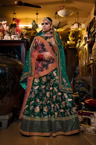 Dazzling Dark Green Dori Sequins And Thread Embroidered Taffeta Silk Designer Lehenga For Wedding