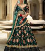Dazzling Dark Green Dori Sequins And Thread Embroidered Taffeta Silk Designer Lehenga For Wedding