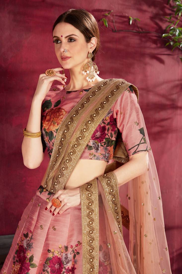 Hypnotizing Peach Pearl Dori And Sequins Embroidered Art Silk Lehenga Choli For Bride