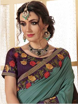 Turquoise woven faux chiffon saree with blouse 2