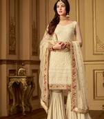Cream embroidered net salwar