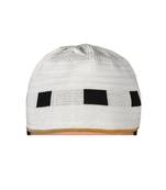 white islamic prayer cap with black box pattern