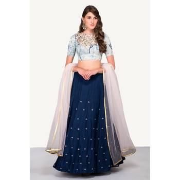 Printed cotton top with hand embroidery on neckline in zari and silk lehenga with buttis and powder pink dupatta 1