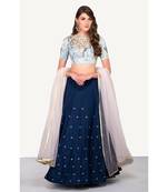 Printed cotton top with hand embroidery on neckline in zari and silk lehenga with buttis and powder pink dupatta