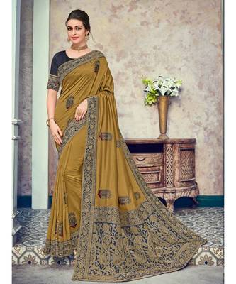 green embroidered silk blend saree with blouse 1