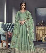 Green embroidered silk salwar with dupatta