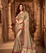 Gold embroidered georgette saree with blouse
