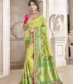 Green embroidered silk saree with blouse