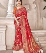 Red embroidered silk saree with blouse