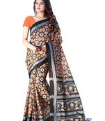 Orange printed satin saree with blouse