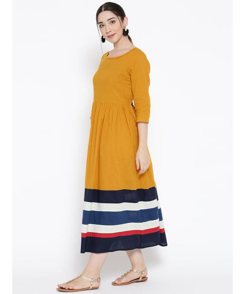 yellow plain cotton stitched kurti