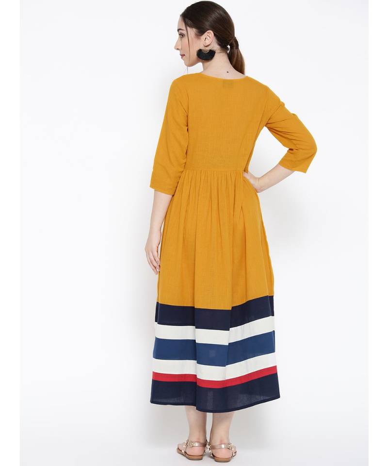 yellow plain cotton stitched kurti