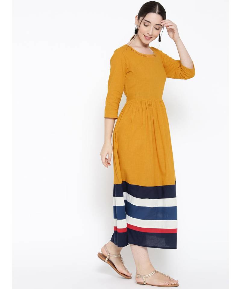 yellow plain cotton stitched kurti
