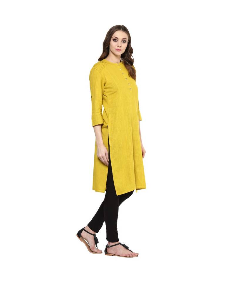 yellow plain cotton stitched kurti