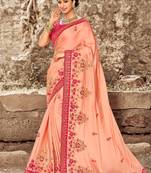 Peach embroidered georgette saree with blouse