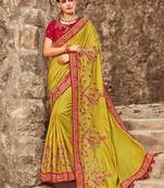 Lime embroidered georgette saree with blouse