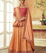 Peach embroidered brocade semi stitched lehenga