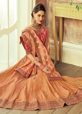 Peach embroidered brocade semi stitched lehenga 2