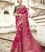 Magenta woven designer banarasi silk blend wedding saree with blouse by Monjolika